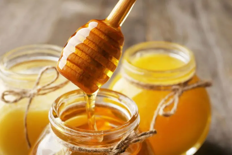 trị sưng nướu răng tại nhà bằng mật ong